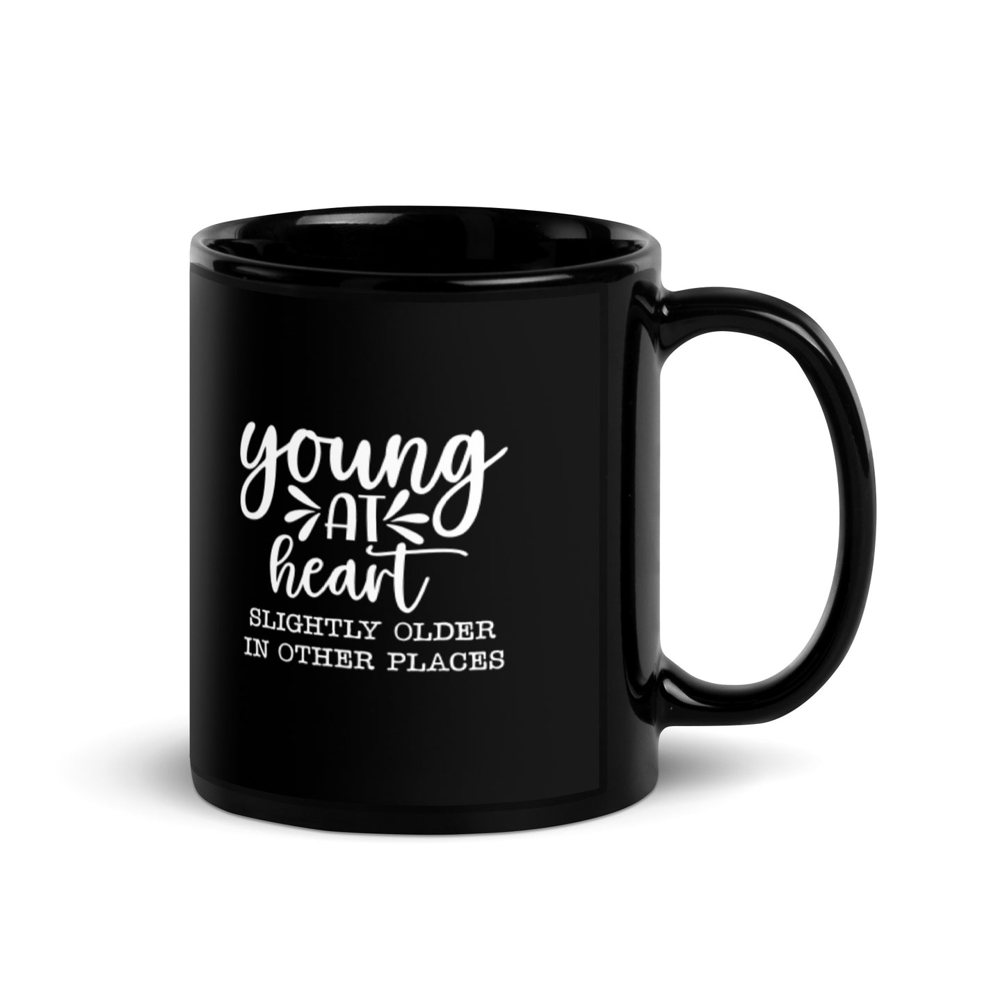 Young at Heart Slightly Older in Other Places Black Glossy Mug